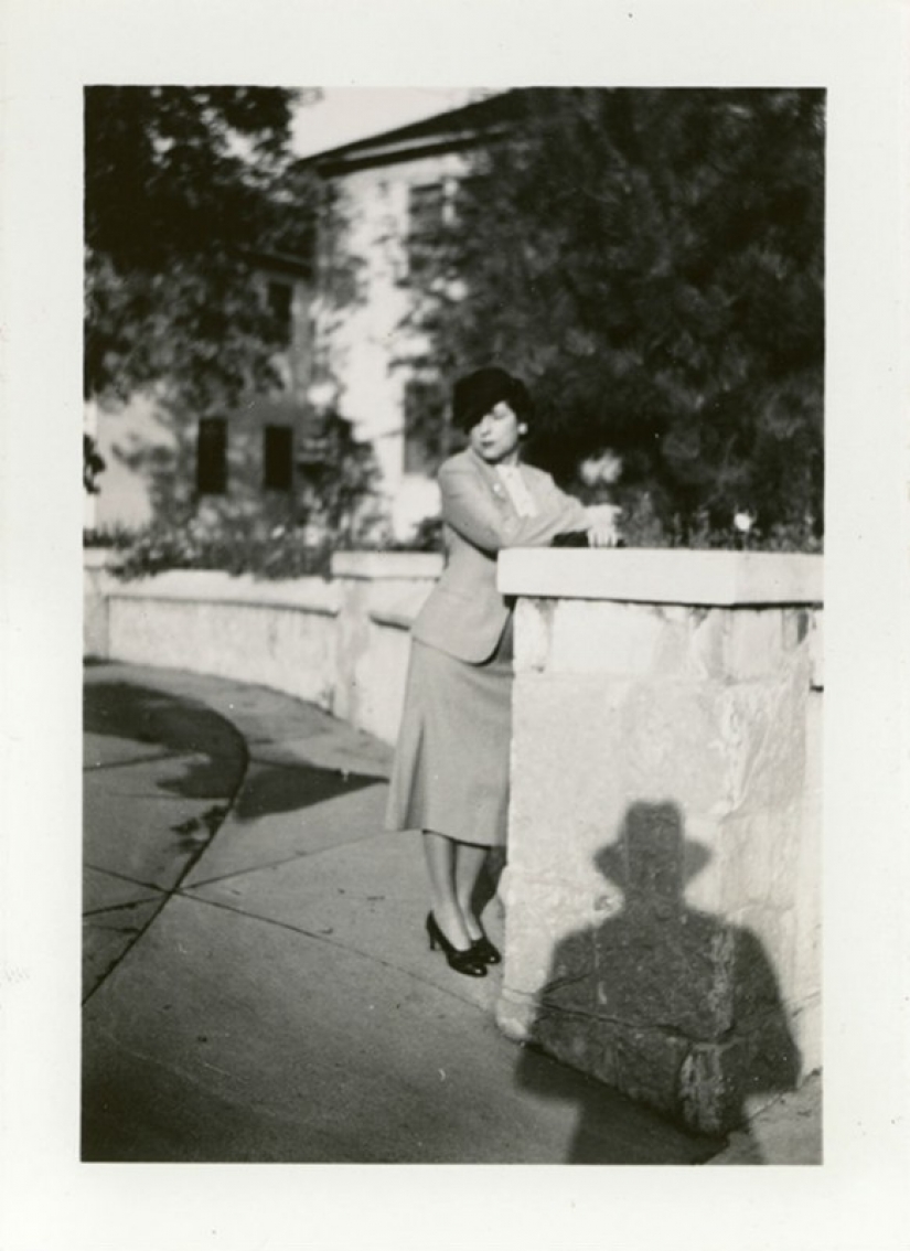 13 vintage photographs on which people are haunted by the shadow of the unknown in the hat