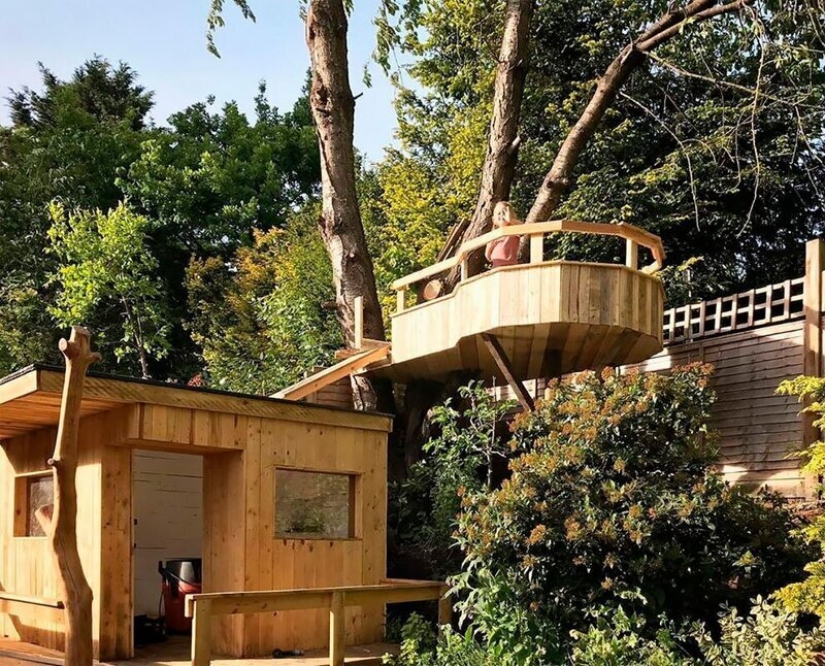 A mi hija le encantó! La casa del árbol de tablas viejas, que fue construido por un padre que cuida