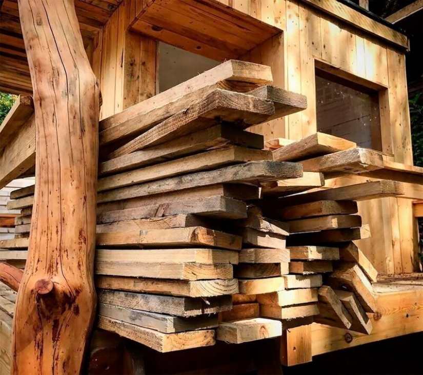 A mi hija le encantó! La casa del árbol de tablas viejas, que fue construido por un padre que cuida