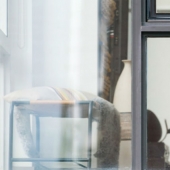 A photographer secretly watching his housemates and removes them