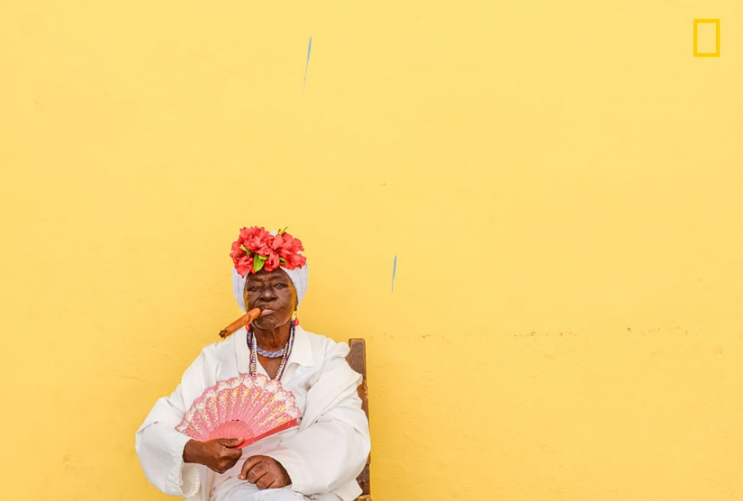 A proud Cuban women and happy Tibetan monks, in the National Geographic photo contest: People