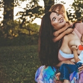 A special relationship: a mother feeds her five year old son three times a day