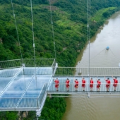 China has opened the suspended glass bridge and immediately set several world records