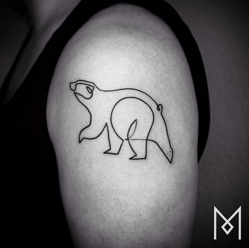 Cool minimalist tattoo, drawn with a single line
