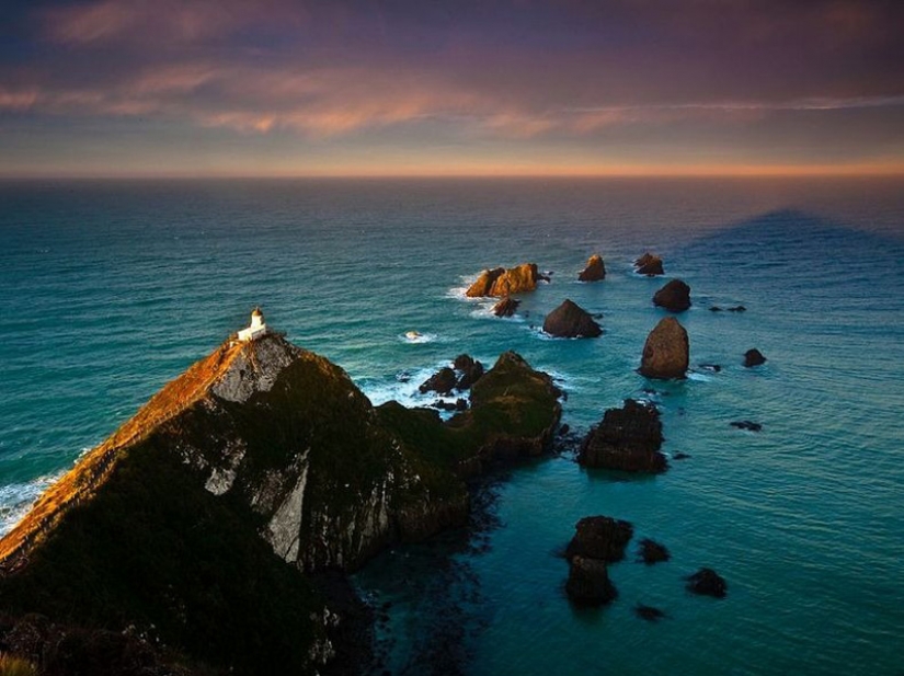 El faro de Nugget point en Nueva Zelanda El faro de Nugget point en Nueva Zelanda