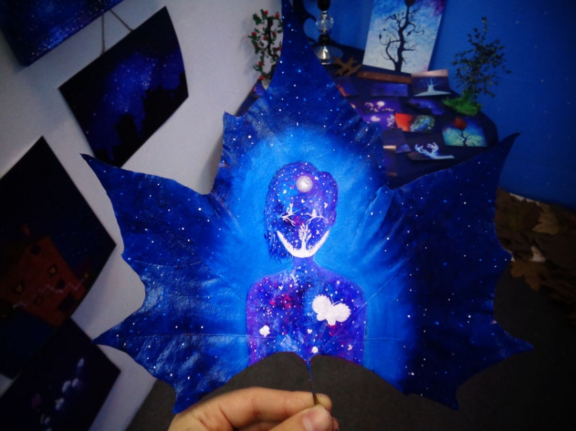 Fantasy worlds on a dry maple leaf