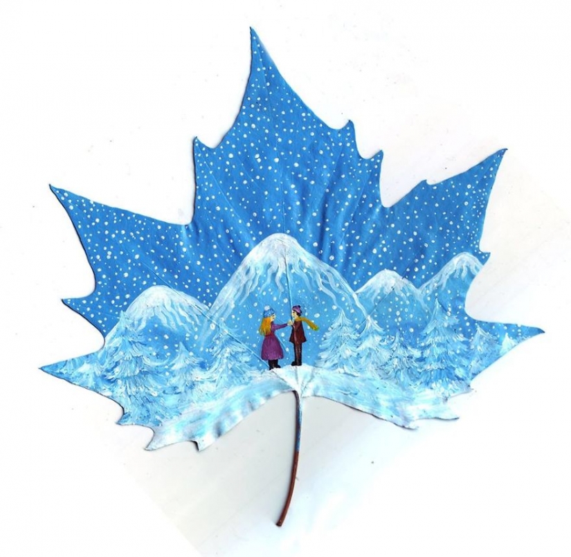 Fantasy worlds on a dry maple leaf