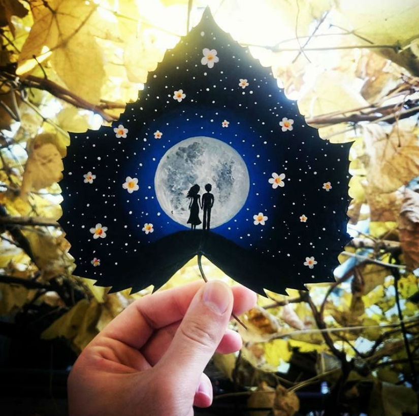 Fantasy worlds on a dry maple leaf