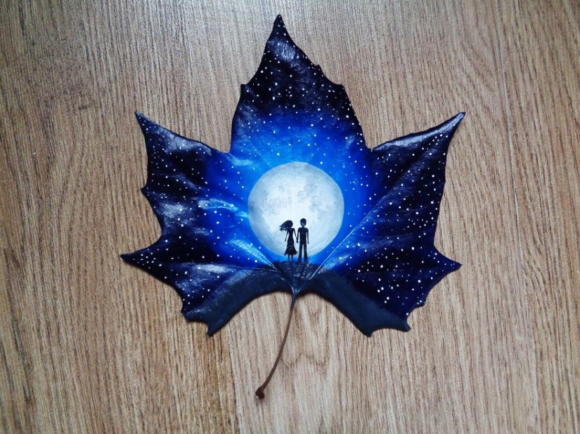 Fantasy worlds on a dry maple leaf