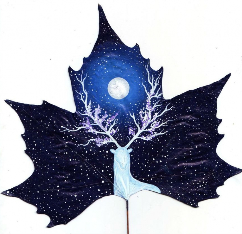 Fantasy worlds on a dry maple leaf