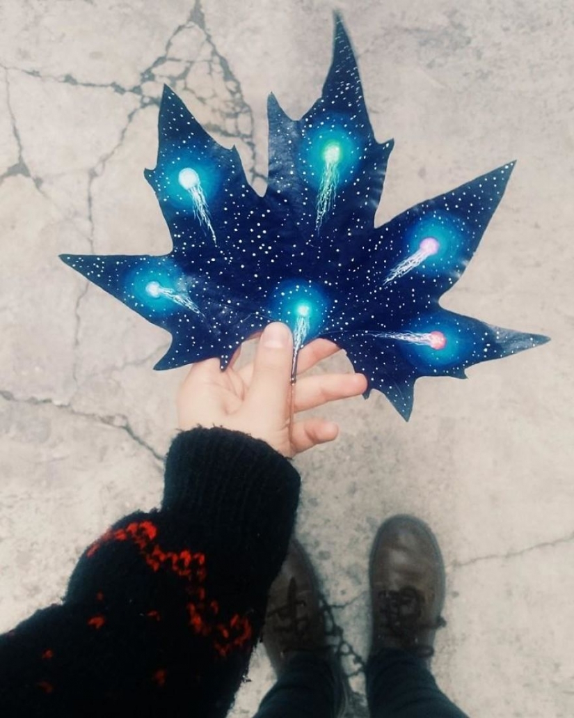 Fantasy worlds on a dry maple leaf