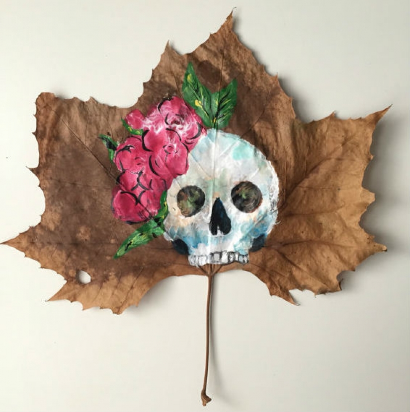 Fantasy worlds on a dry maple leaf