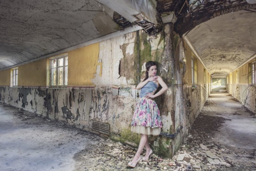 Guy photographing his girlfriend in an abandoned locations across Europe
