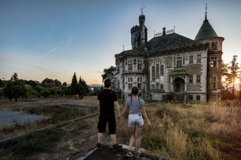Guy photographing his girlfriend in an abandoned locations across Europe