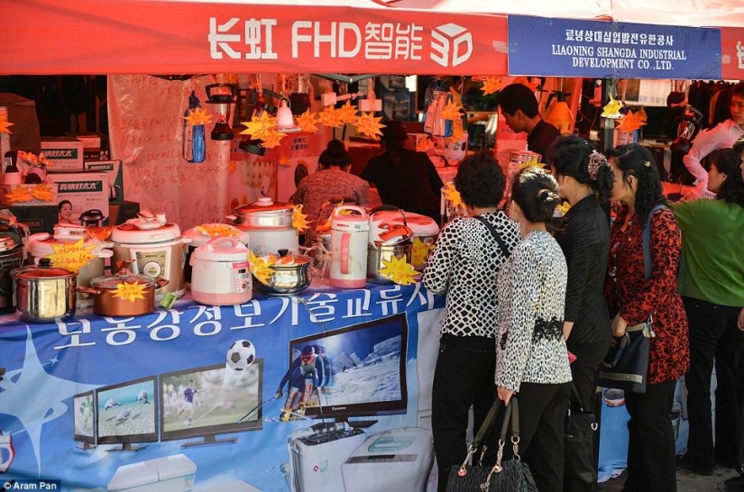 Not the depressed North Korea: playing on the beach girls, trendy shops and restaurants