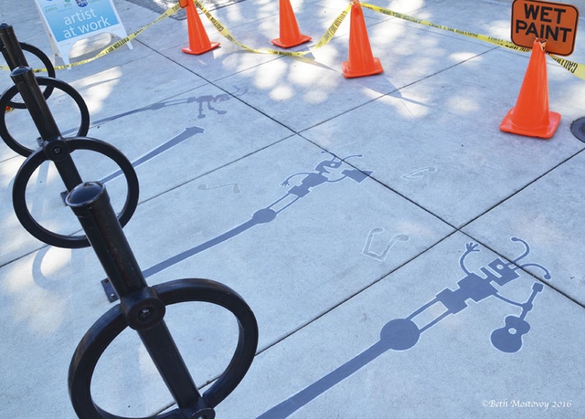 Street artist "substitute" 20 the urban shadows to the flowers and monkeys, and many didn't even notice