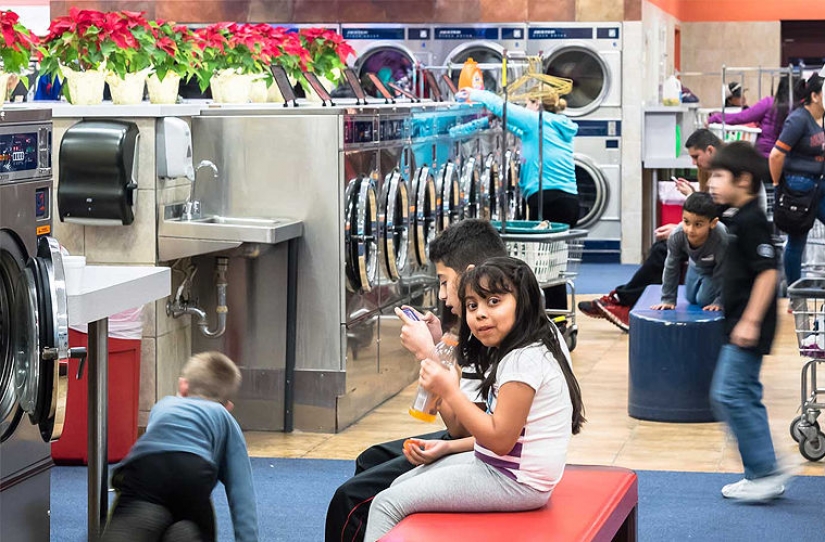 Why Americans are washing in the Laundry and not home?
