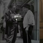 Why Walt Disney in all his photos shows two fingers