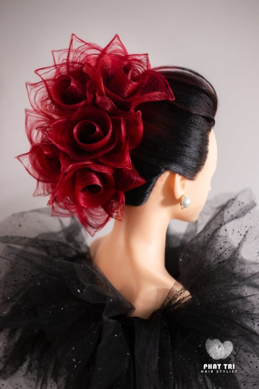 A talented hairdresser creates spectacular hairstyles in the form of flowers A talented hairdresser creates spectacular hairstyles in the form of flowers