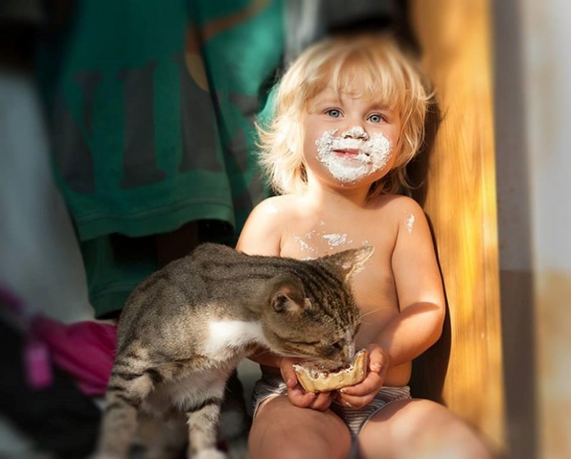 Adorable photos proving that your child needs a cat