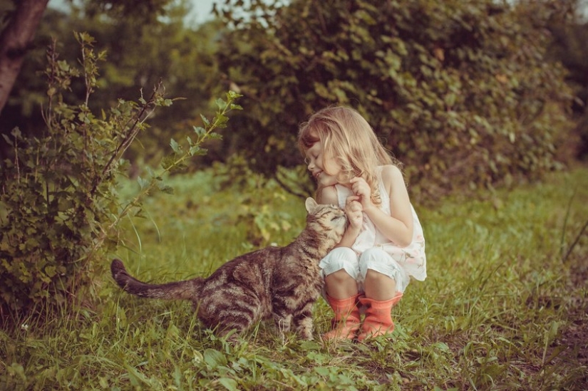 Adorable photos proving that your child needs a cat