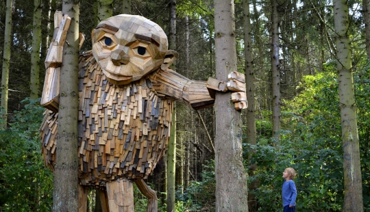 An artist has drawn a treasure map and hidden friendly giants in the forests of Copenhagen