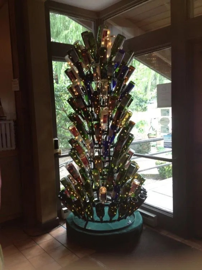 British Housewives collect bottles to make them a Christmas tree