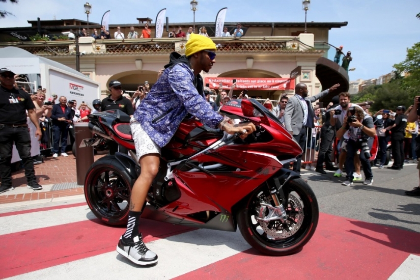 Cool guy on cool cars: a chic collection of cars of the racer Lewis Hamilton