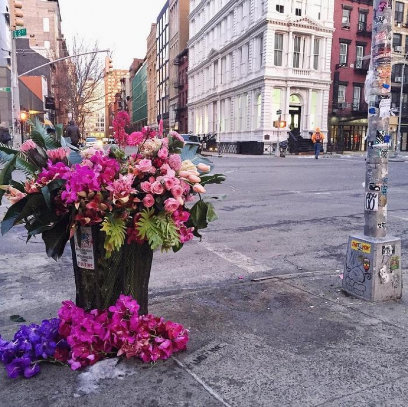 Crime or art? Someone is turning New York City trash cans into giant vases of flowers.