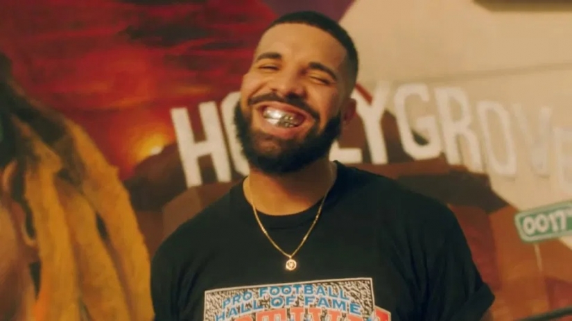 Diamante de dientes: las estrellas se jactan grizli de oro y piedras preciosas