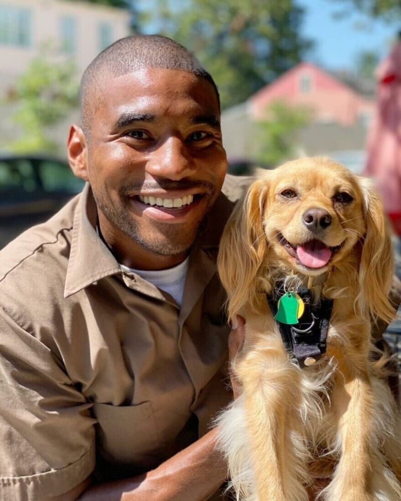 Funny courier photographed with every dog he meets
