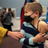 In photos: children in the US receive a vaccine from COVID