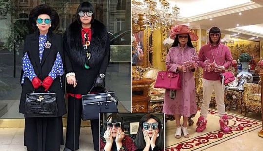 On the same page: mother and son from Thailand wear the same outfits On the same page: mother and son from Thailand wear the same outfits