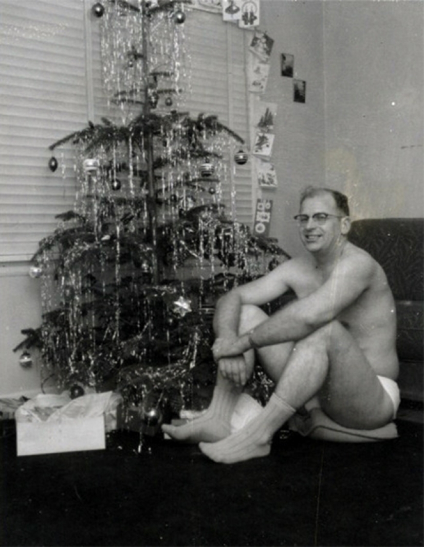Playful photo under the Christmas tree from old albums