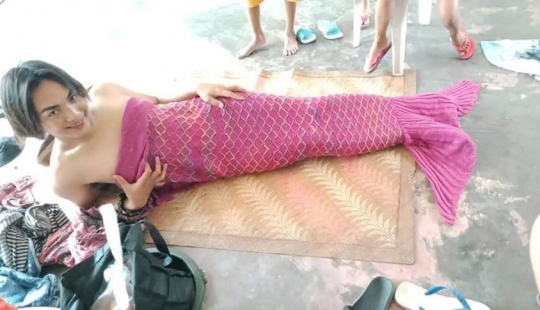 Por amor de dios, y con un lado del arco: los Filipinos que huyeron de el volcán, compartir fotos de donaciones de ropa Por amor de dios, y con un lado del arco: los Filipinos que huyeron de el volcán, compartir fotos de donaciones de ropa