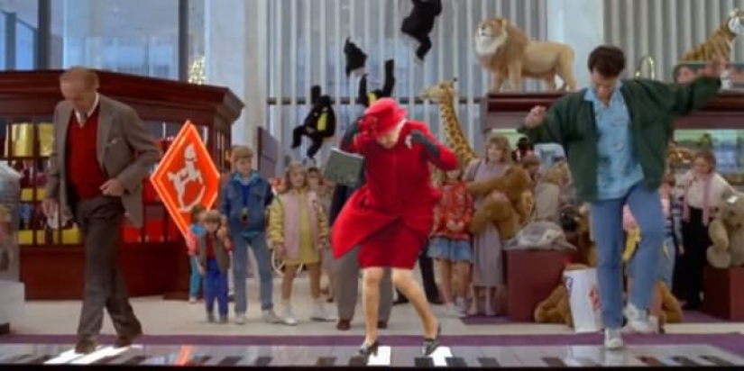 Queen Elizabeth II cuts through the waves and dancing with the king of pop