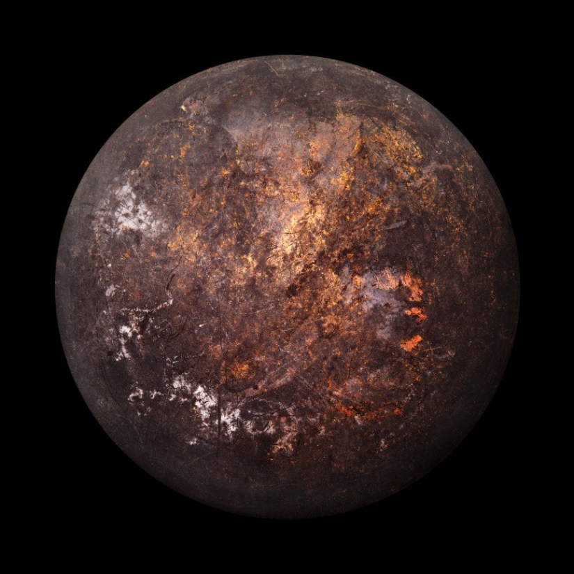 "Satellite images" of the bottoms of old pots and pans from the photographer Christopher Jonassen