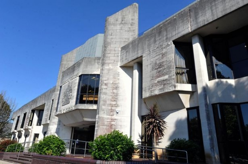 Silent protest: A British man has been standing in the middle of the road in the same place for seven years, creating traffic jams Silent protest: A British man has been standing in the middle of the road in the same place for seven years, creating traffic jams