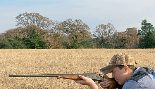 Taught to kill: children show off their hunting trophies after the opening of the teen season in Texas Taught to kill: children show off their hunting trophies after the opening of the teen season in Texas