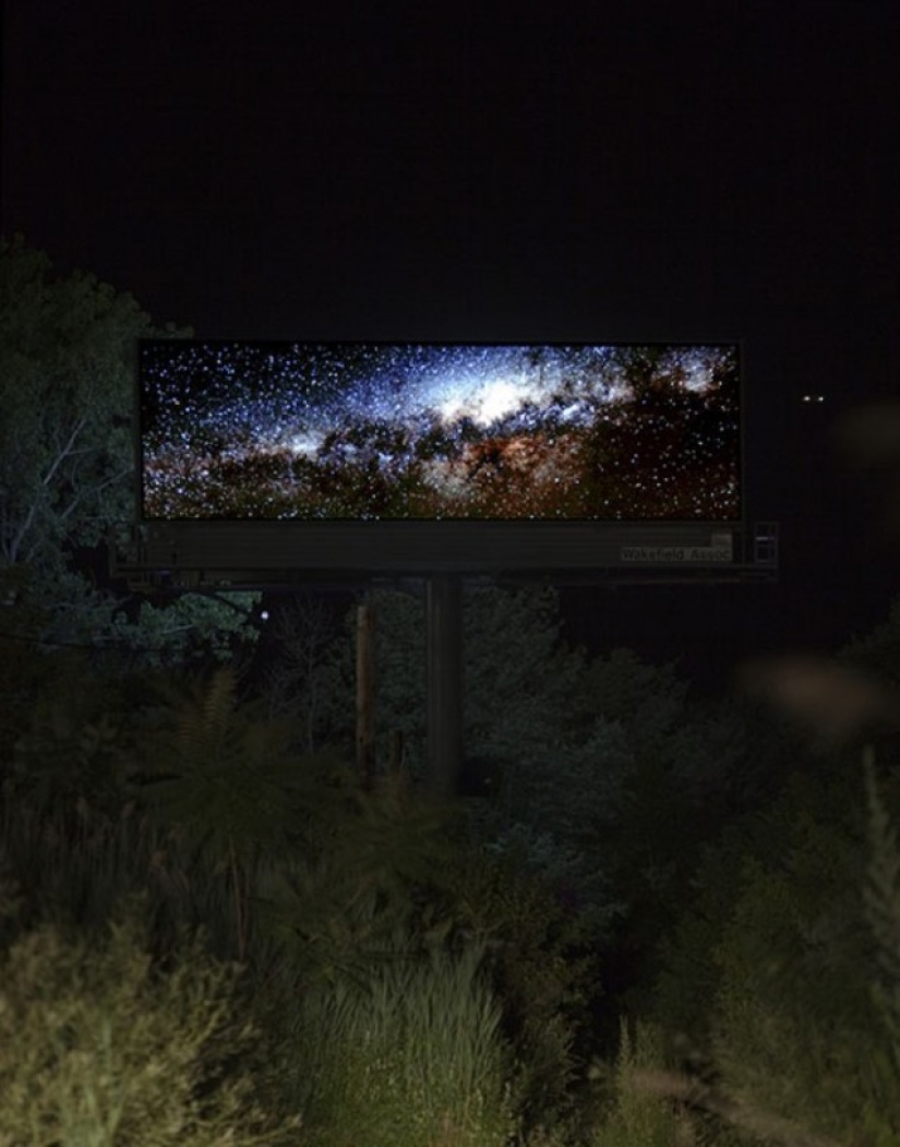 The artist bought a huge billboard to show the beauty of nature The artist bought a huge billboard to show the beauty of nature
