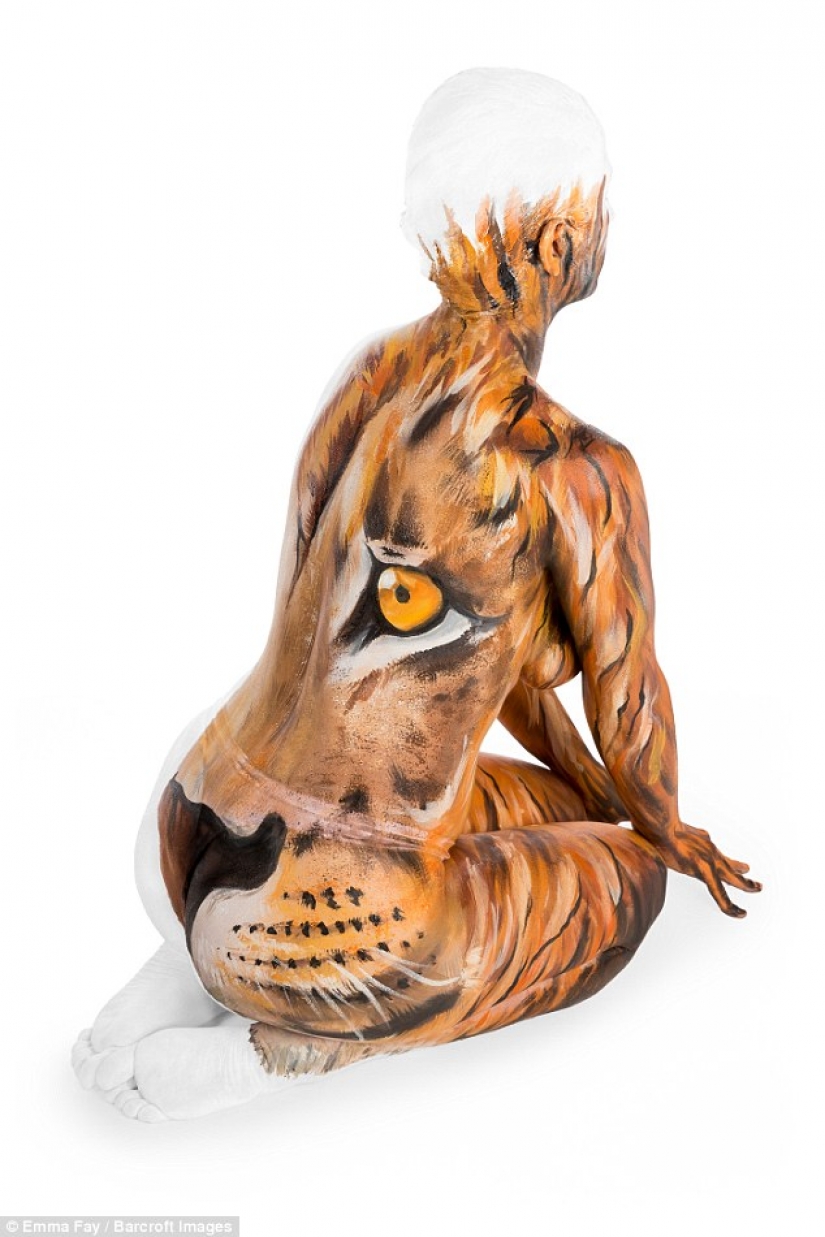 The artist turns naked bodies into optical illusions with wild animals