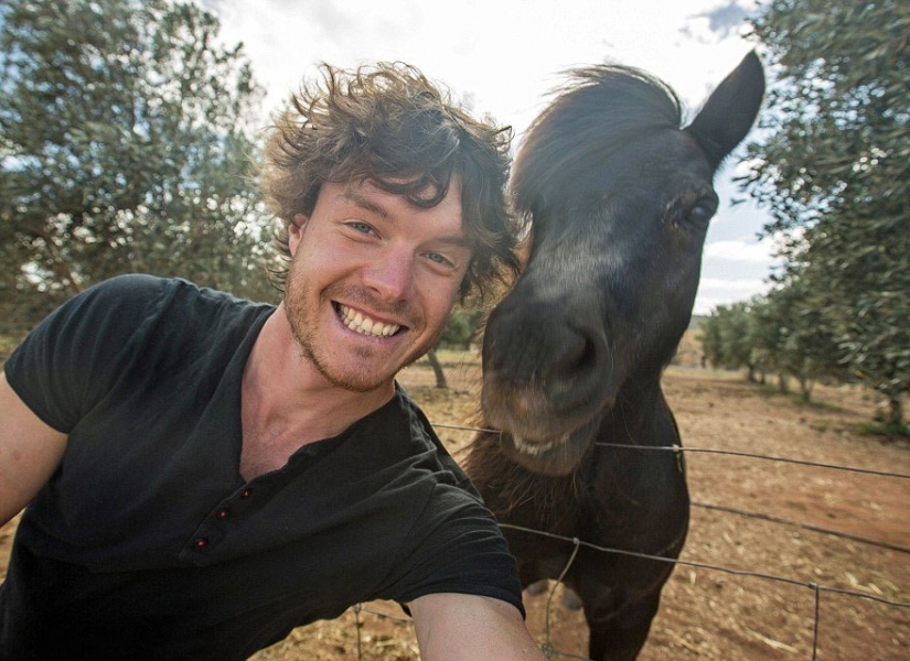 This man has mastered the art of selfies with animals to perfection.