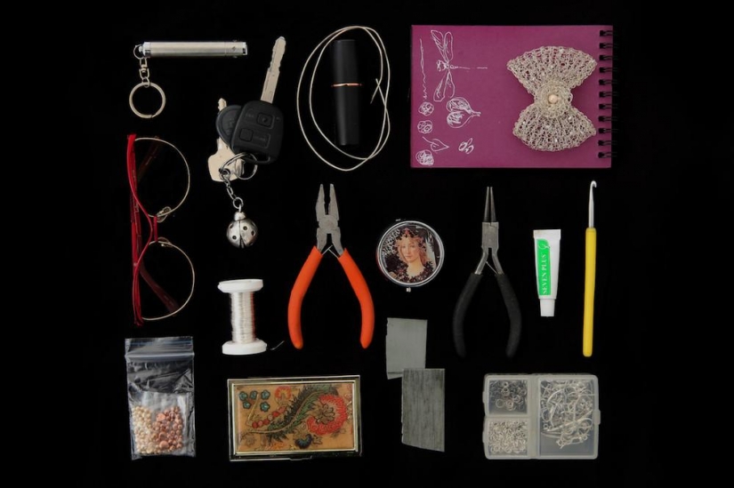 What is stored in women's handbags?