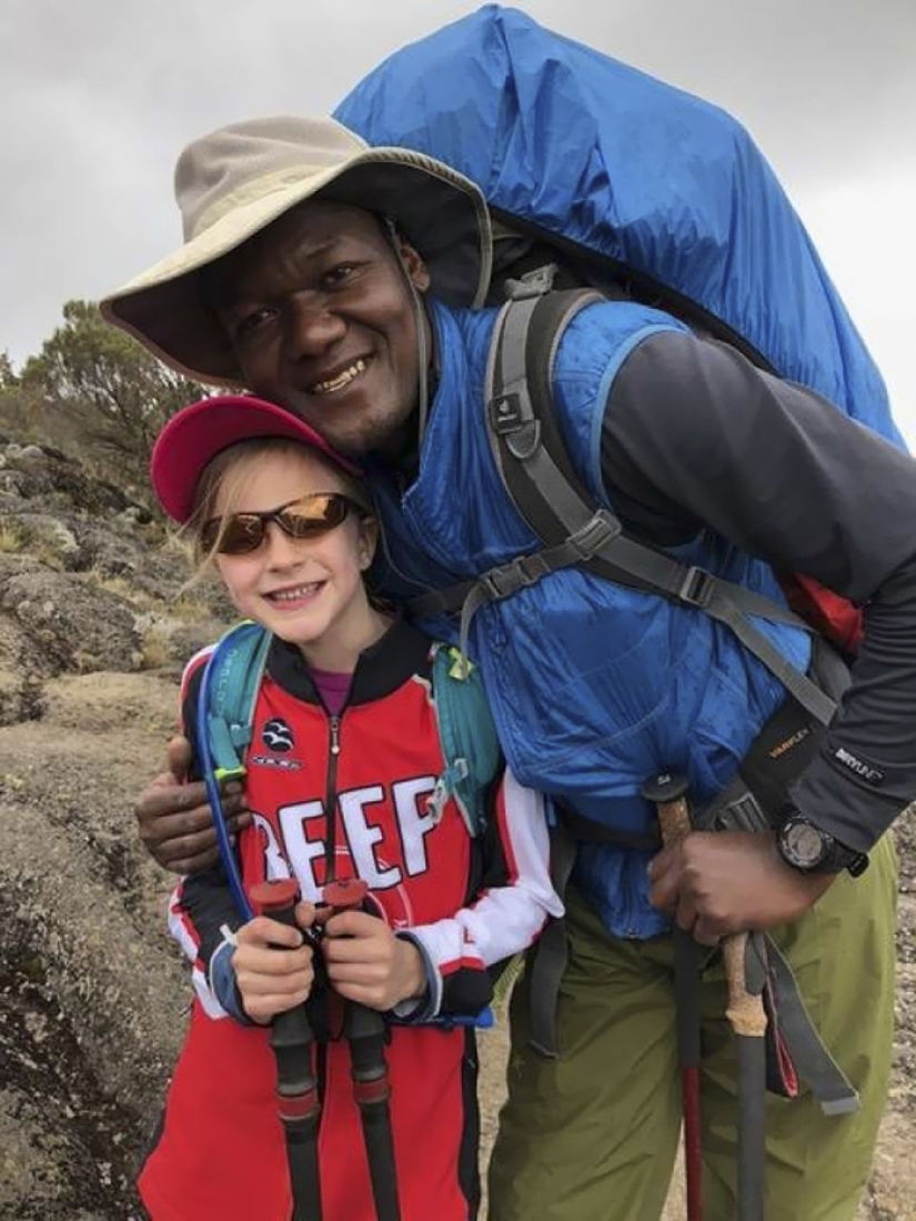 A 7-year-old girl became the youngest conqueror of Kilimanjaro in honor of her late father A 7-year-old girl became the youngest conqueror of Kilimanjaro in honor of her late father