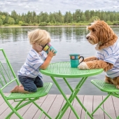 A dog is a person's best friend. A boy and a puppy do not part even in a dream