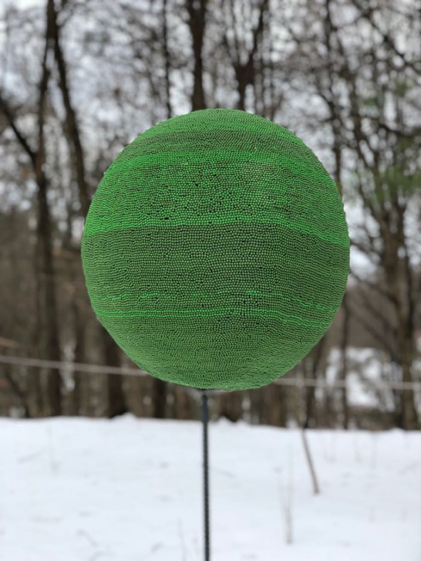 A Reddit user spent a year gluing together a sphere of 42 thousand matches to burn it later