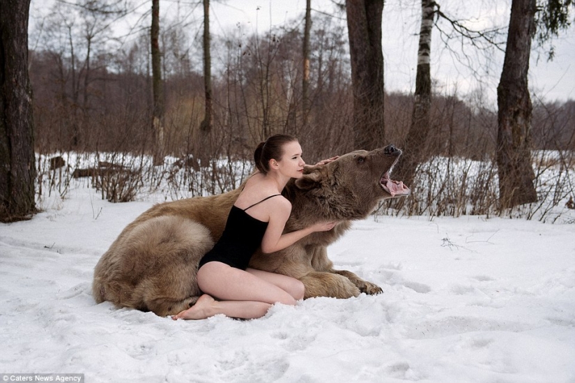 A snowy photo shoot of two models from Russia in an embrace with a bear shocked Europe
