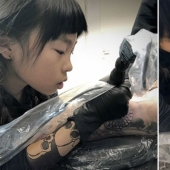 Apple from the apple tree: A 10-year-old Japanese woman gets a tattoo, following in her father's footsteps