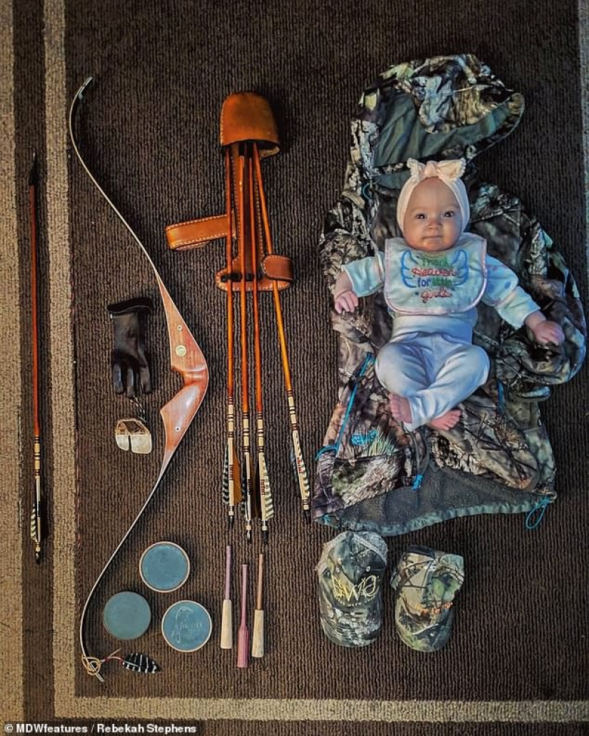 Basic instinct: a mother goes hunting with a 9-month-old baby behind her back