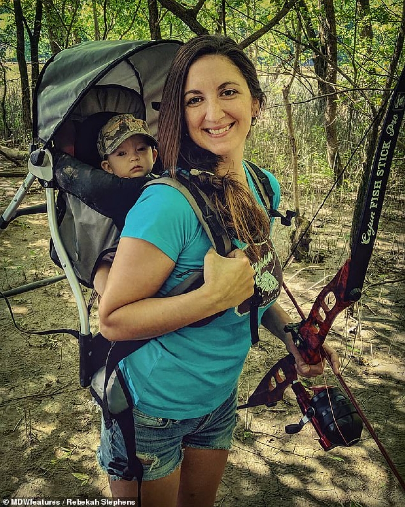 Basic instinct: a mother goes hunting with a 9-month-old baby behind her back